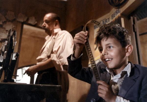 Alfredo (Philippe Noiret, L) and Toto (Salvatore Cascio), in "Cinema Paradiso." (Miramax)
