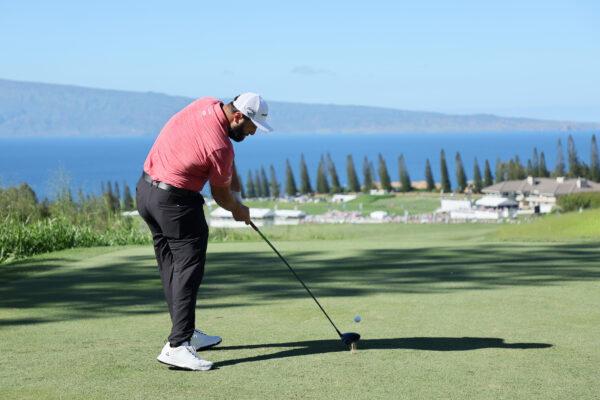 Jon Rahm of Spain plays his shot from the 18th tee during the final round of the Sentry Tournament of Champions at Plantation Course at Kapalua Golf Club in Lahaina, Hawaii, on Jan. 8, 2023. (Andy Lyons/Getty Images)
