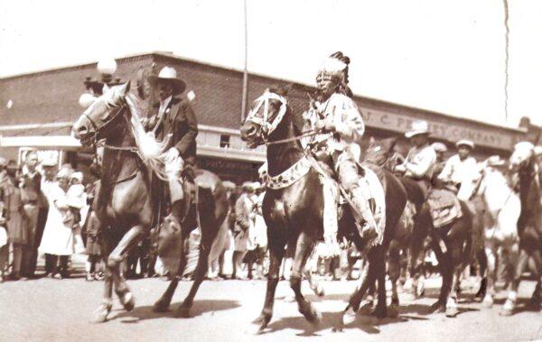 Haines (L) and a Pawnee chief on horseback during a parade, circa 1920s. (Courtesy of J.D. Haines)