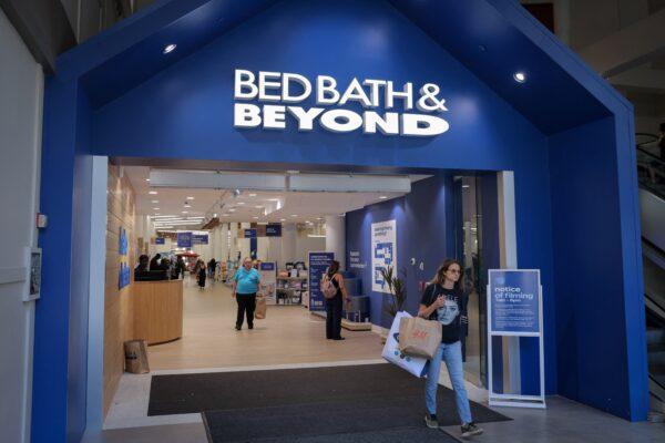 A person exits a Bed Bath & Beyond store in Manhattan, New York on June 29, 2022. (Andrew Kelly/Reuters)