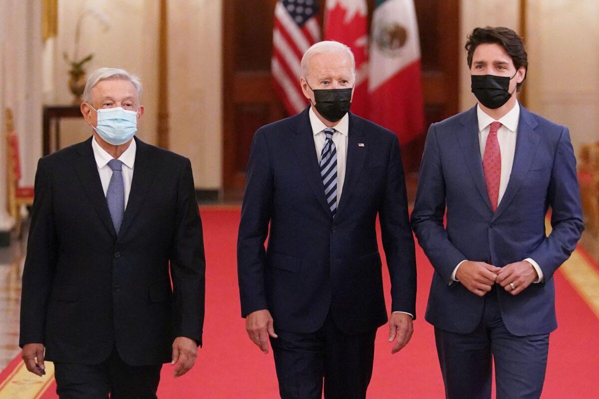 President Joe Biden (C), Canada's Prime Minister Justin Trudeau (R) and Mexico's President Andres Manuel Lopez Obrador (L) arrive for the North American Leaders' Summit (NALS) in the East Room of the White House in Washington, on Nov. 18, 2021. (Mandel Ngan/AFP via Getty Images)
