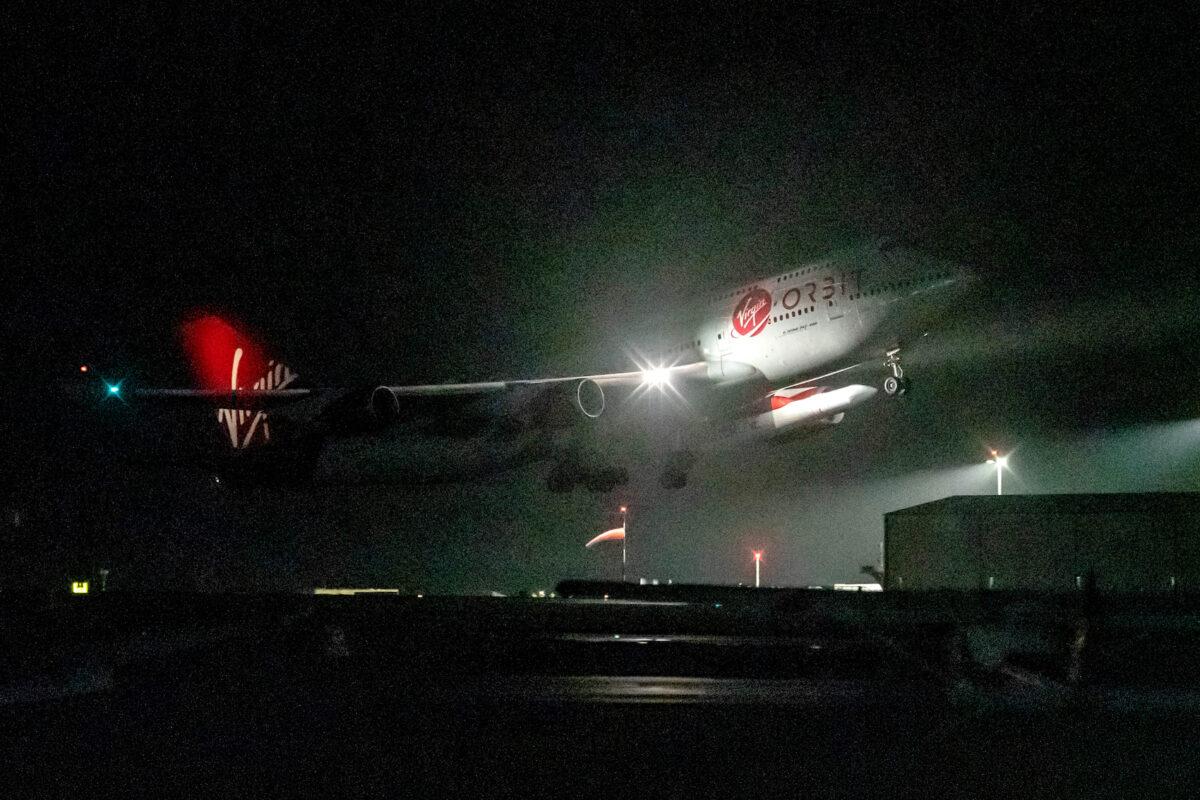 A repurposed Virgin Atlantic Boeing 747 aircraft, named Cosmic Girl, carrying Virgin Orbit's LauncherOne rocket, takes off from Spaceport Cornwall at Cornwall Airport, Newquay, on Jan. 9, 2023. (Ben Birchall/PA)