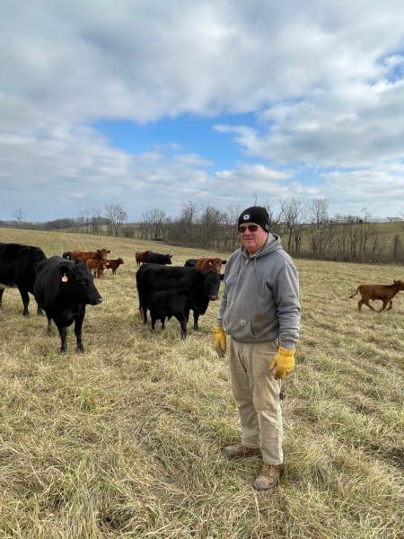 Kentucky farmer Charlie Masters with his cows. (Courtesy of Charlie Masters.)