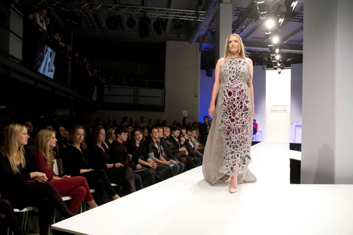 Tatjana Patitz wears a creation of Lavera as part of the Mercedes-Benz Fashion Week in Berlin on Jan. 21, 2015. (Joerg Carstensen/dpa via AP)