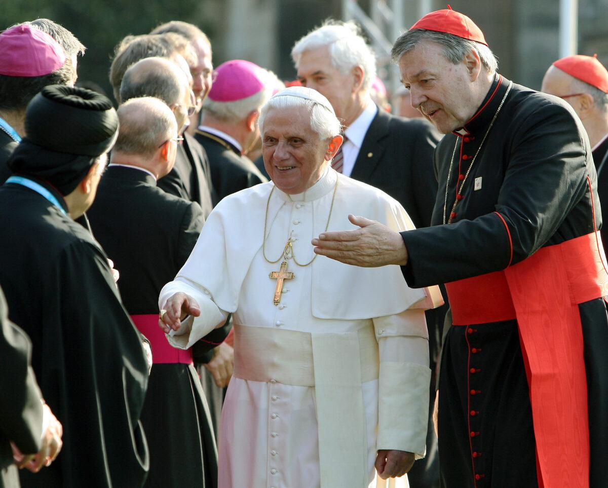 Pope Benedict XVI is introduced to guests by Cardinal George Pell (R) during the ceremonial welcome at Government House as part of World Youth Day in Sydney, Australia, on July 17, 2008. (AAP Image/POOL/Greg Wood)
