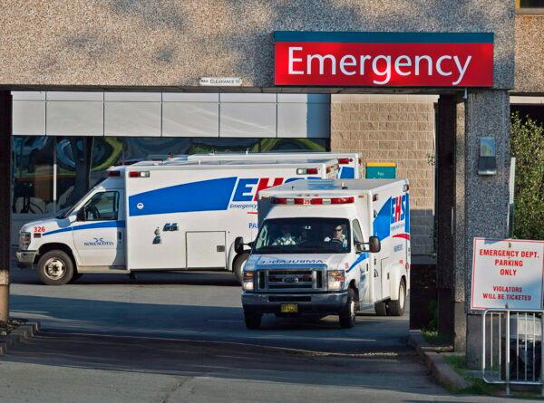 Paramedics are seen at the Dartmouth General Hospital in Dartmouth, N.S., in a file photo. (The Canadian Press/Andrew Vaughan)