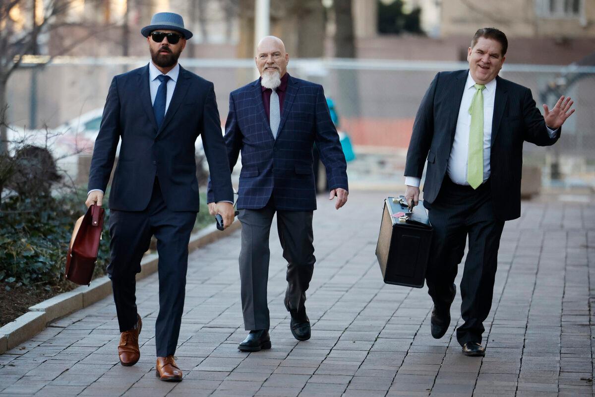 Richard "Bigo" Barnett (C) arrives at federal district court with his attorneys Joseph McBride (L) and Bradford Geyer for jury selection in his trial in Washington, D.C., on Jan. 9, 2023. (Chip Somodevilla/Getty Images)