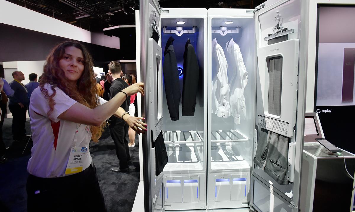 An LG spokesperson demostrates the LG Styler, a household clothing care machine, at the LG booth during CES 2016 at the Las Vegas Convention Centerin Las Vegas, Nev. on Jan. 6, 2016. (David Becker/Getty Images)