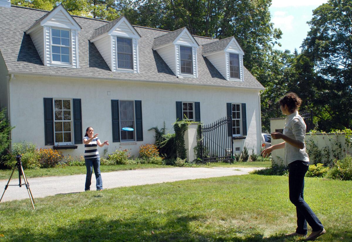 Reporters play frisbee outside Joe Biden's home in Wilmington, Del., in 2008. (William Thomas Cain/Getty Images)