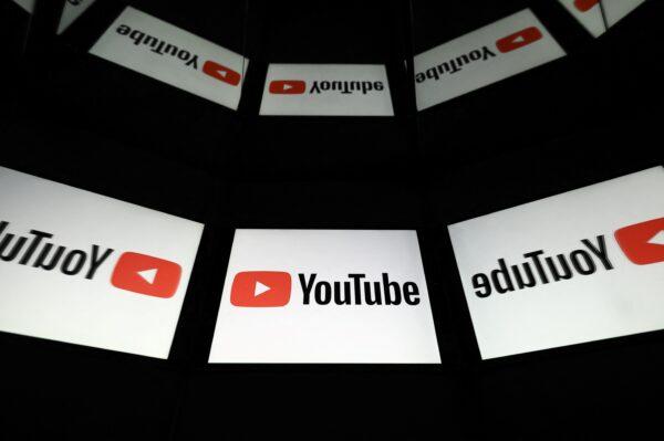 The logo of YouTube social media displayed by a tablet in Toulouse, France, on Oct. 5, 2021. (Lionel Bonaventure/AFP via Getty Images)