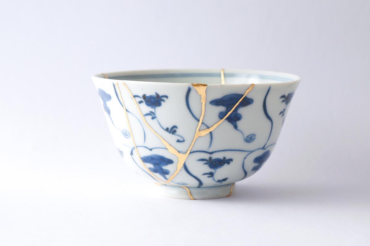 An example of a porcelain cup fixed using kintsugi. (Marco Montalti/Shutterstock)
