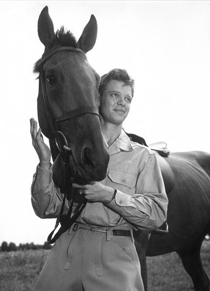 Philip Larimore and Tuckern. The horse was later sold at auction by the Army, and the auctioneers would not allow bids from anyone but Larimore. (At First Light)