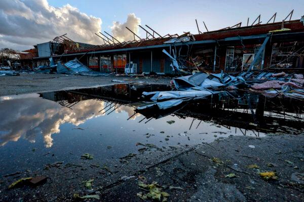The roof of a local business is strewn about after a tornado passed through Selma, Ala., on Jan. 12, 2023. (Butch Dill/ AP Photo)
