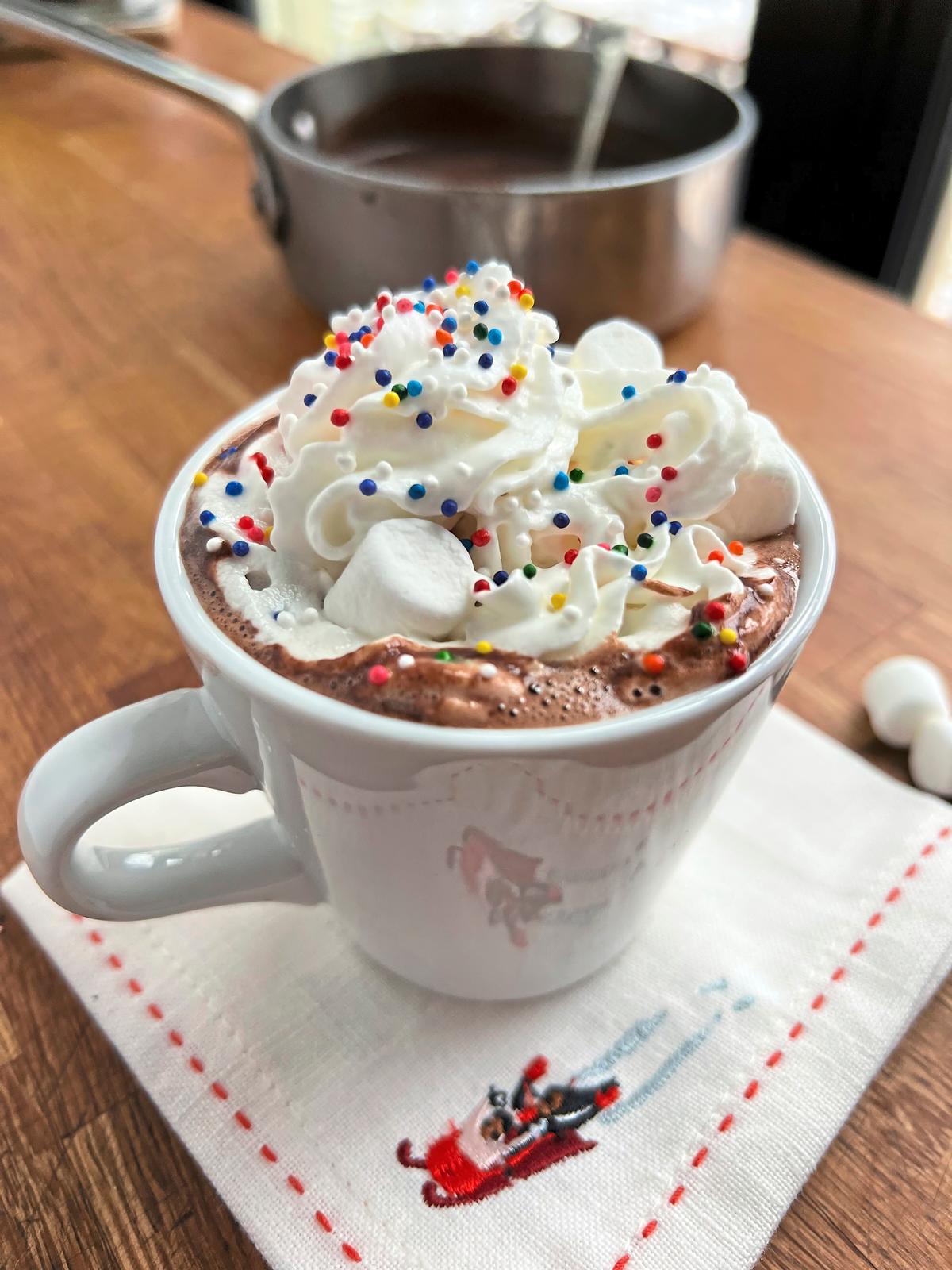 Hot cocoa topped with whipped cream and sprinkles is a favorite kids' winter warm-me-up. (Gretchen McKay/Pittsburgh Post-Gazette/TNS)