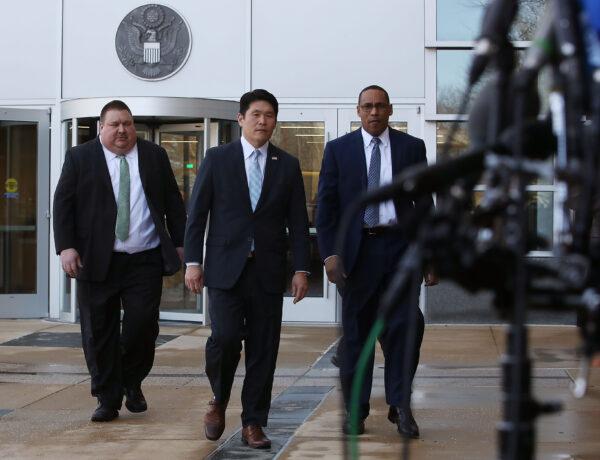 U.S. Attorney Robert Hur (C), FBI Special Agent Gordon Johnson (R), and Art Walker (L) of the Coast Guard Investigative Service, walk up to speak to the media about Christopher Paul Hasson after a hearing at the United States District Court Greenbelt Division is shown on February 21, 2019 in Greenbelt, Maryland. (Mark Wilson/Getty Images)