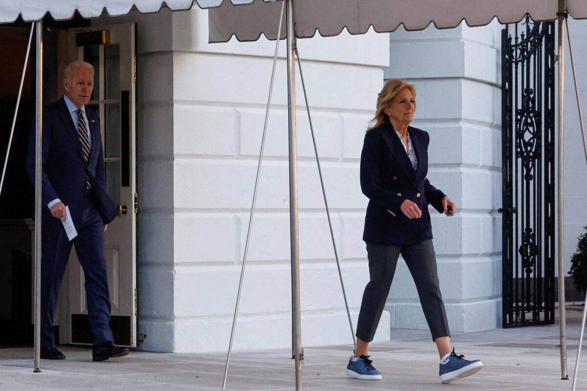 President Joe Biden and First Lady Jill Biden walk to board the Marine One helicopter to travel to Walter Reed National Military Medical Center for the first lady to undergo Mohs surgery for skin cancer, from the White House on Jan. 11, 2023. (Jonathan Ernst/Reuters)