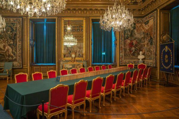 The king still meets with members of the Swedish government in the Cabinet Room of the Royal Palace. Mirrors and rich tapestries line the gilded walls of what was once Gustav III’s dining room. (<a href="https://www.shutterstock.com/image-photo/stockholm-sweden-12032022-royal-palace-kungliga-2231580209">Ungvari Attila</a>/Shutterstock)