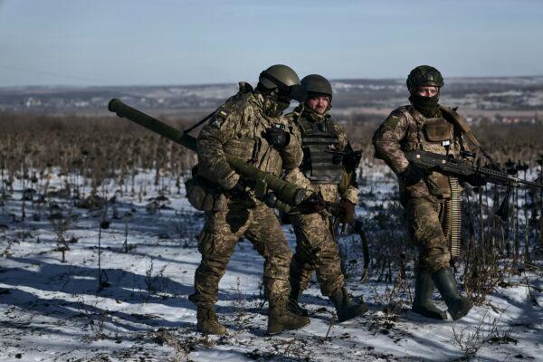  Ukrainian soldiers on their positions in the frontline near Soledar, in the Donetsk region of Ukraine, on Jan. 11, 2023. (Libkos/AP Photo)