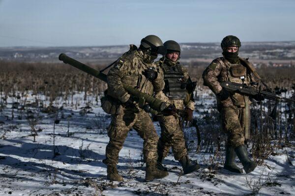 Ukrainian soldiers on their positions in the frontline near Soledar, in the Donetsk region of Ukraine, on Jan. 11, 2023. (Libkos/AP Photo)