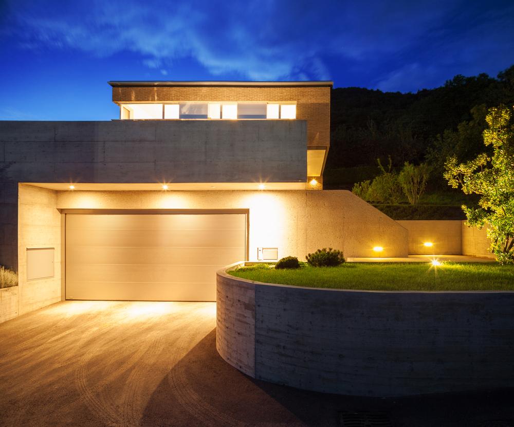 Exterior lighting discourages burglars from approaching the house at night.(alexandre zveiger/Shutterstock)