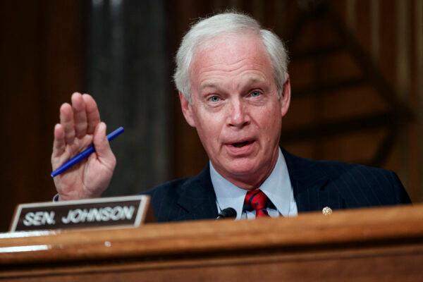 Sen. Ron Johnson (R-Wis.) questions Neera Tanden before the Senate Homeland Security and Government Affairs Committee on her nomination to become the director of the Office of Management and Budget (OMB) on Feb. 9, 2021. (Ting Shen/POOL/AFP via Getty Images)