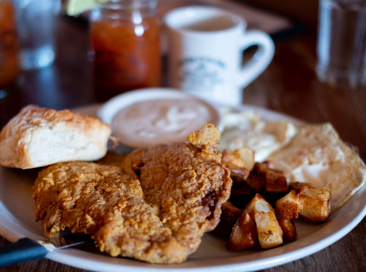 Fried chicken and buttermilk biscuits have been on the menu at Puckett's since 1950 in Columbia, Tennessee. (Benjamin Myers/TNS)