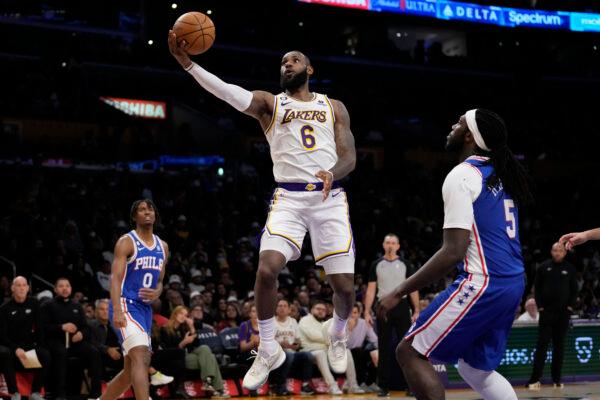 Los Angeles Lakers forward LeBron James (6) shoots during the first half of an NBA basketball game against the Philadelphia 76ers in Los Angeles on Jan. 15, 2023. (Ashley Landis/AP Photo)
