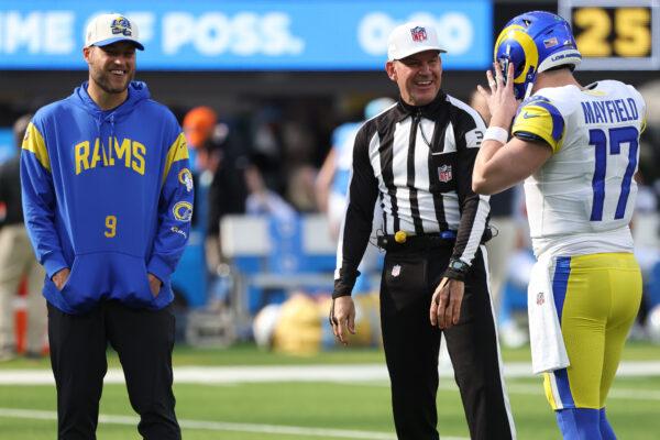 Baker Mayfield (17) of the Los Angeles Rams speaks with referee Clete Blakeman (34) and Matthew Stafford (9) of the Los Angeles Rams prior to the game against the Los Angeles Chargers at SoFi Stadium in Inglewood, Calif., on Jan. 1, 2023. (Katelyn Mulcahy/Getty Images)