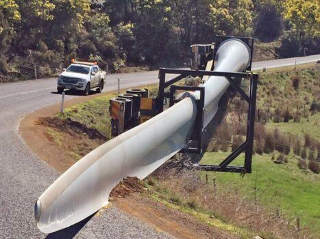 A supplied image shows a truck that rolled while carrying a 68-metre-long wind turbine blade at Apsley in the state's Central Highlands, Tasmania, Australia obtained on Sept. 19, 2019. (AAP Image/Supplied by Tasmania Police
