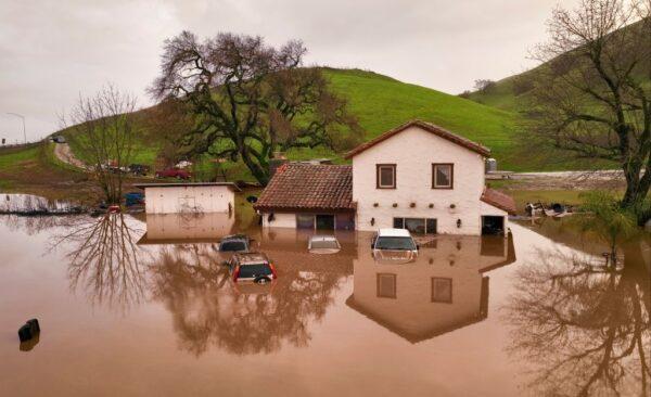 A house is seen partially submerged under floodwaters in Gilroy, Calif., on Jan. 09, 2023. (Josh Edelson/AFP via Getty Images)