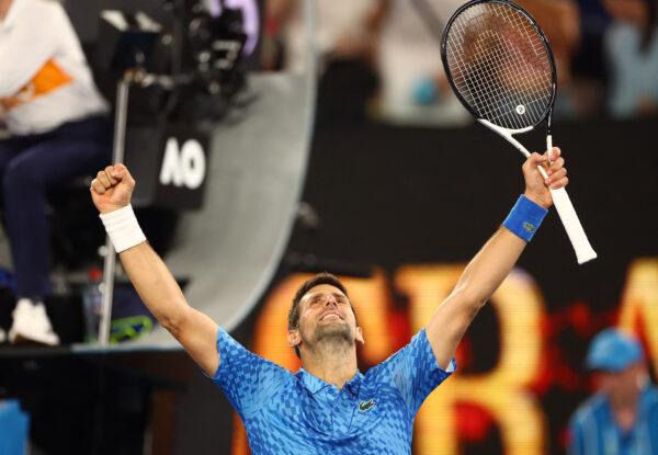 Serbia's Novak Djokovic celebrates winning his first round match against Spain's Roberto Carballes Baena during the Australian Open tennis match at Melbourne Park in Melbourne, Australia, on Jan. 18, 2023. (Carl Recine/Reuters)