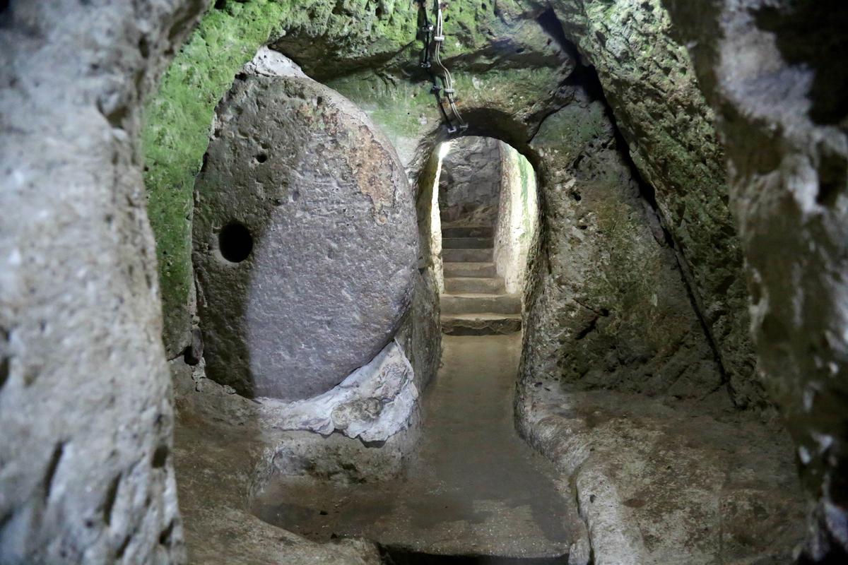 A circular stone door between tunnels in Derinkuyu in Turkey. (Maria Studio/Shutterstock)