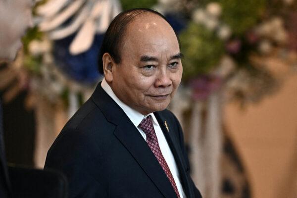 Vietnam's President Nguyen Xuan Phuc arrives to attend APEC Leader's Dialogue with APEC Business Advisory Council during the Asia-Pacific Economic Cooperation (APEC) summit in Bangkok, Thailand, on Nov. 18, 2022. (Lillian Suwanrumpha/Pool via Reuters)