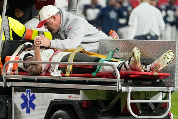 Tampa Bay Buccaneers wide receiver Russell Gage is taken off the field after being injured against the Dallas Cowboys during the second half of an NFL wild card football game in Tampa, Fla., on Jan. 16, 2023. (Chris Carlson/AP Photo)