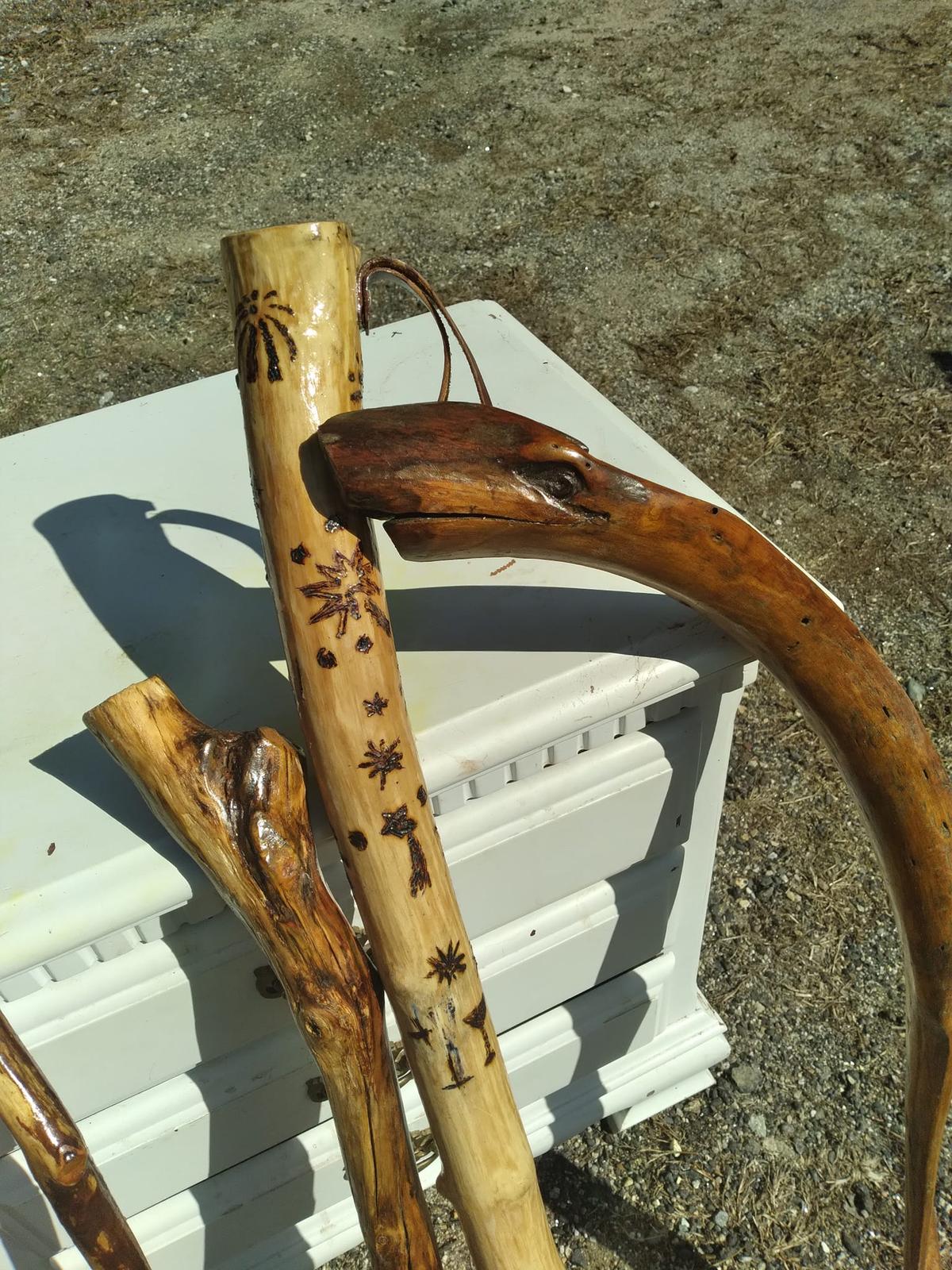 The handcrafted canes displayed in their backyard shop. (Courtesy of Trevor Michaud)
