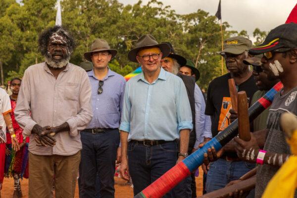 Australian Prime Minister Anthony Albanese walks with Yolngu community during Garma Festival 2022 at Gulkula, Australia, on July 29, 2022. (Tamati Smith/Getty Images)