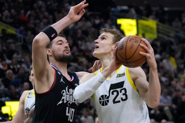 Los Angeles Clippers center Ivica Zubac (40) defends against Utah Jazz forward Lauri Markkanen (23) during the first half of an NBA basketball game in Salt Lake City, on Jan. 18, 2023. (Rick Bowmer/AP Photo)