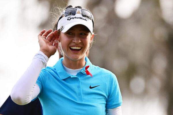 Nelly Korda of the United States reacts after making her putt on the on the 18th hole during the first round of the Hilton Grand Vacations Tournament of Champions at Lake Nona Golf & Country Club in Orlando, Fla., on Jan. 19, 2023. (Julio Aguilar/Getty Images)