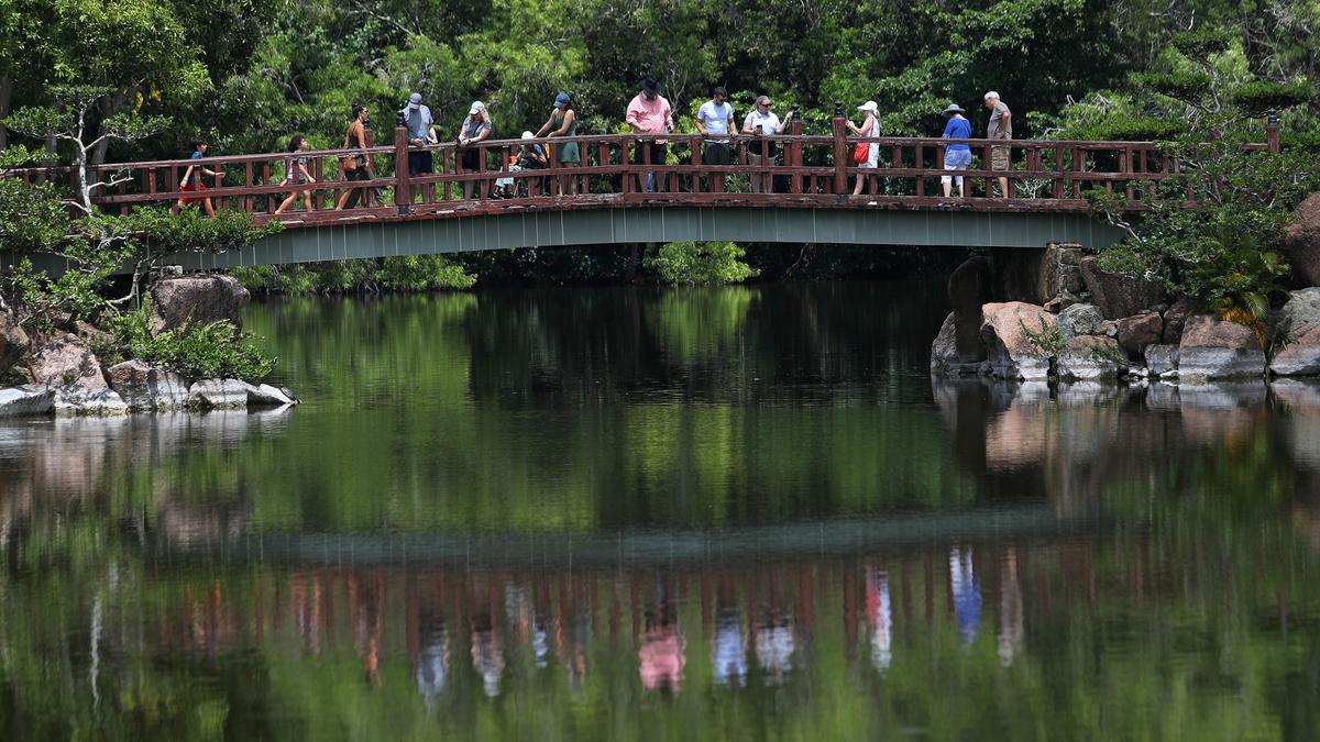 Visitors stroll on a bridge at the Morikami Museum and Japanese Gardens in Delray Beach, Florida. (John McCall/South Florida Sun Sentinel/TNS)