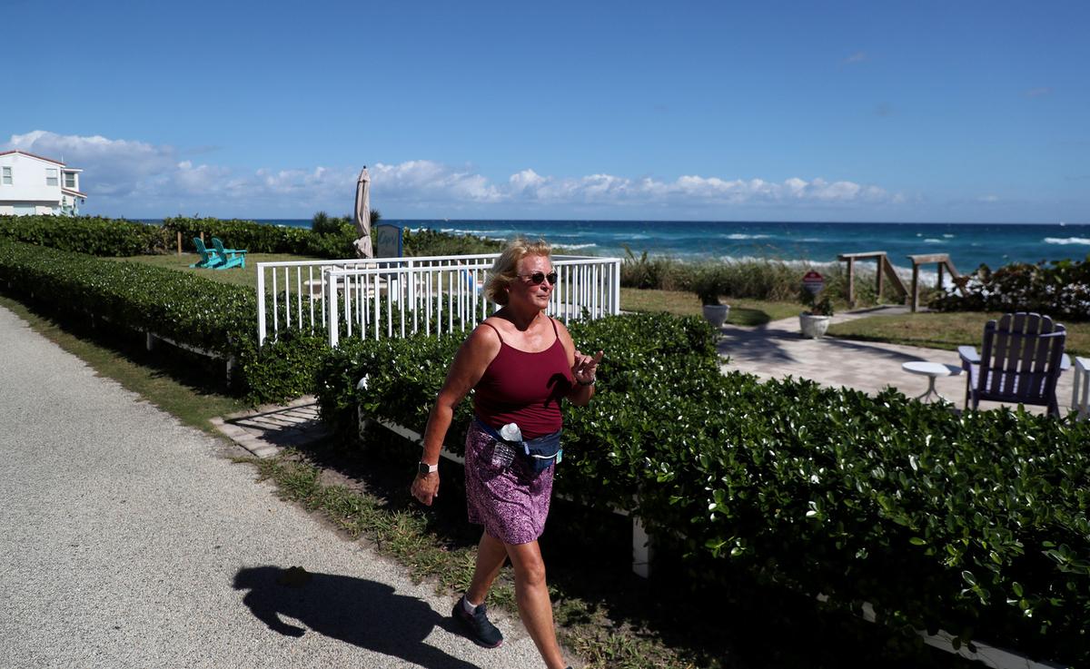 Pat Minishak of Boynton Beach, Florida, takes her daily walk along Old Ocean Blvd in Ocean Ridge. (Carline Jean/South Florida Sun Sentinel/TNS)