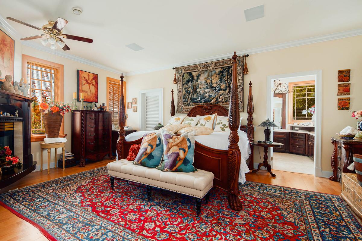 The master bedroom has an airy, spacious layout, with a fireplace, tall ceilings and crown molding, plus a massive bathroom. (Courtesy of Sotheby’s International Realty Canada)