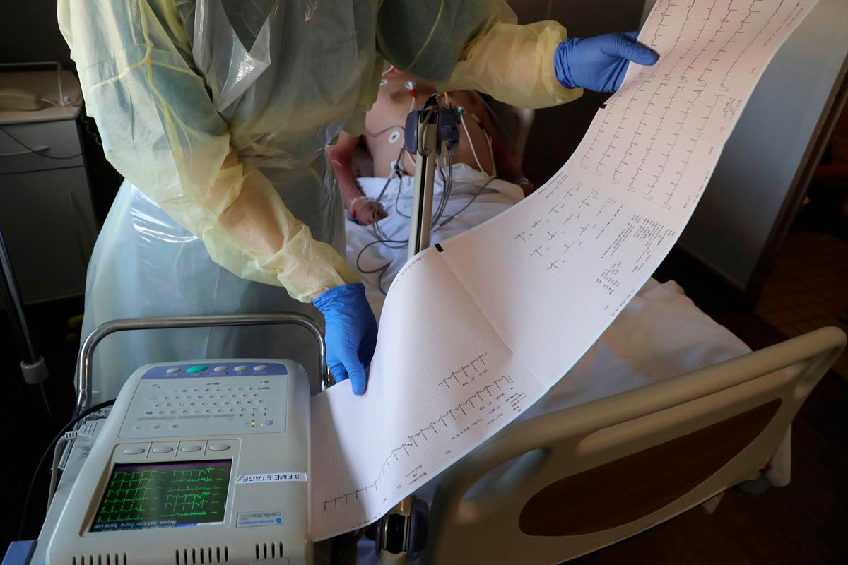 A nurse checks an electrocardiogram in Bagnolet, near Paris, France, on April 8, 2020. (Ludovic Marin/AFP via Getty Images)