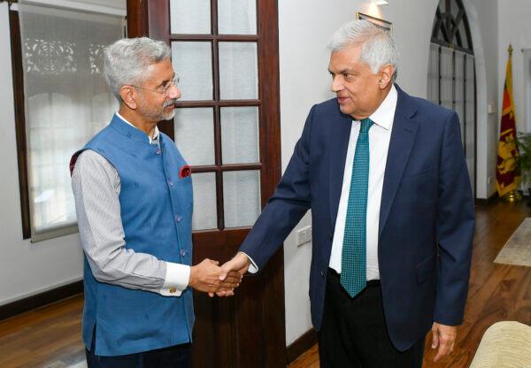 Sri Lankan President Ranil Wickremesinghe, right, shake hands with<br/>India’s Foreign Minister S. Jaishankar in Colombo, Sri Lanka, on Jan. 20, 2023. (Sri Lankan President's Office via AP)