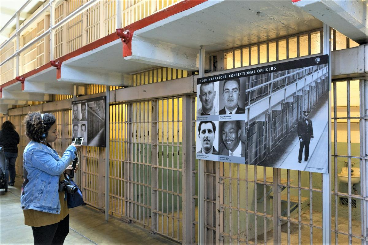 A visitor learns what it was like to be a prisoner at Alcatraz in San Francisco, California. (Courtesy of Bennn/Dreamstime.com)