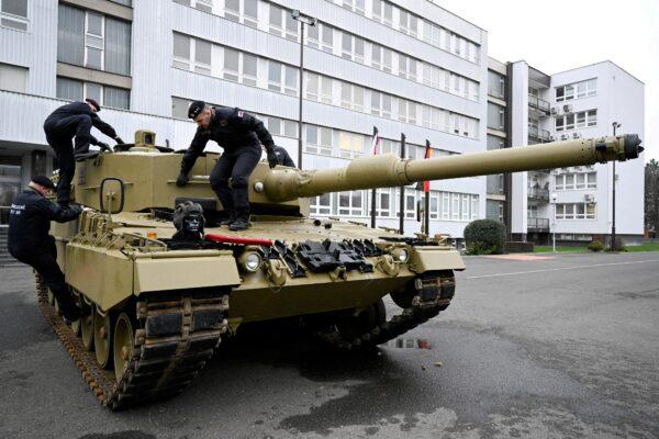 Germany delivers its first Leopard tanks to Slovakia as part of a replacement deal that allows Slovakia to donate fighting vehicles to Ukraine, on Dec. 19, 2022. (Radovan Stoklasa/Reuters)