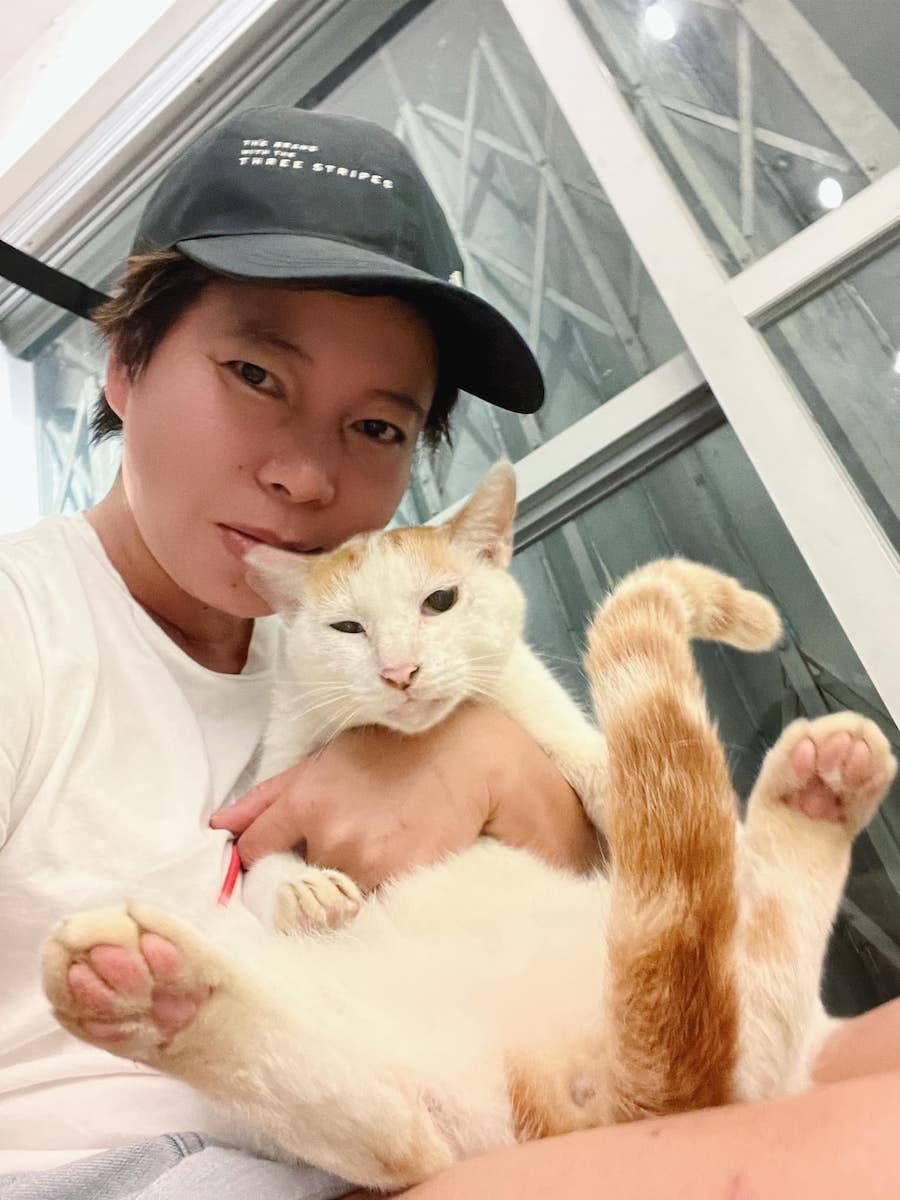 German, Cheung the “Cat-woman,” has been working as a feline volunteer for years. (Courtesy of German Cheung)