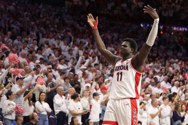 Oumar Ballo (11) of the Arizona Wildcats celebrates during the final moments of the second half of the NCAA game against the UCLA Bruins at McKale Center in Tucson, Ariz., on Jan. 21, 2023. (Christian Petersen/Getty Images)
