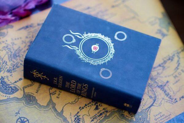  A copy of J.R.R. Tolkien’s epic myth “The Lord of the Rings” rests on a map of Middle Earth. (Astfreelancer/Shutterstock)