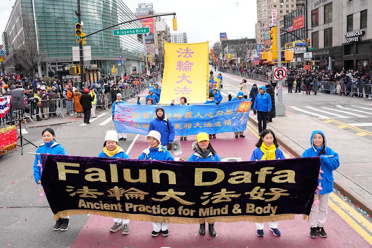  Falun Gong practitioners take part in the Chinese New Year Parade in the Flushing neighborhood of Queens, N.Y., on Jan. 21, 2023. (Larry Dye/The Epoch Times)