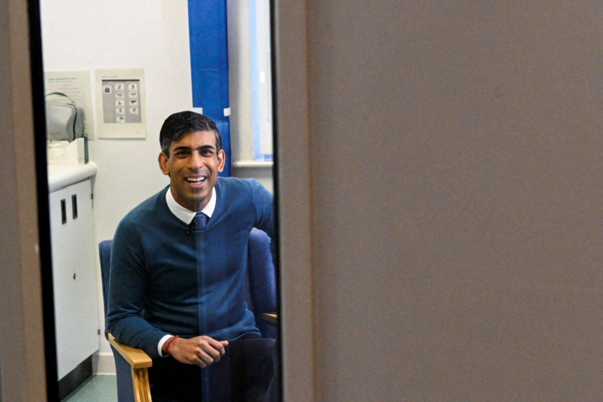 British Prime Minister Rishi Sunak attends a media broadcast interview during a visit to Berrywood Hospital in Northampton on Jan. 23, 2023. (Toby Melville/POOL/AFP via Getty Images)